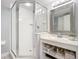 Bathroom with shower, vanity, and built-in shelving at 426 Bouchelle Dr # 303, New Smyrna Beach, FL 32169