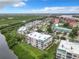 Aerial view of waterfront condo community with resort-style amenities at 426 Bouchelle Dr # 303, New Smyrna Beach, FL 32169