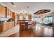 Spacious kitchen featuring an island, stainless steel appliances, and wood cabinetry at 300 Quay Assisi Ct, New Smyrna Beach, FL 32169