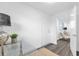 Home office with glass desk and view to another room at 1456 N Grandview Ave, Daytona Beach, FL 32118