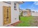 Outdoor shower with wood and metal accents at 1456 N Grandview Ave, Daytona Beach, FL 32118