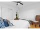 Bedroom with a queen bed, ceiling fan, and hardwood floors at 1456 N Grandview Ave, Daytona Beach, FL 32118