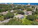 Aerial view of house, pool and neighborhood near beach at 813 E 13Th Ave, New Smyrna Beach, FL 32169