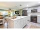 Modern kitchen with a large island, stainless steel appliances, and gray cabinets at 813 E 13Th Ave, New Smyrna Beach, FL 32169
