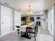 Dining room with table, bench and kitchen view at 813 E 13Th Ave, New Smyrna Beach, FL 32169