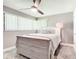 Charming bedroom with a double bed and soft decor at 813 E 13Th Ave, New Smyrna Beach, FL 32169