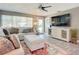 Bright living room with large sectional sofa and flat-screen TV at 813 E 13Th Ave, New Smyrna Beach, FL 32169