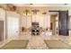 Modern kitchen features granite countertops and white cabinets at 728 Sea Duck Dr, Daytona Beach, FL 32119