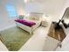 Main bedroom with king-size bed, nightstands, and dresser at 840 Center Ave # 840, Daytona Beach, FL 32117