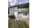 Two-story building with balcony and landscaping at 840 Center Ave # 840, Daytona Beach, FL 32117