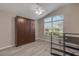 Bedroom with wood flooring and built-in shelving at 1768 Creekwater Blvd, Port Orange, FL 32128