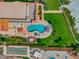 Overhead view of building, pool, and landscaping at 701 N Atlantic Ave # 202, New Smyrna Beach, FL 32169