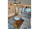 Spacious living room with sectional sofa and wood flooring at 721 S Beach St # 214A, Daytona Beach, FL 32114