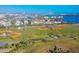 Aerial view showing surrounding area and baseball fields at 721 S Beach St # 214A, Daytona Beach, FL 32114