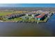Aerial view of waterfront community with pool and docks at 721 S Beach St # 214A, Daytona Beach, FL 32114