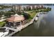 Community waterfront dock with boats and a restaurant at 731 Marina Point Dr # 7310, Daytona Beach, FL 32114