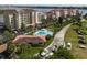 Aerial view of waterfront property showing building, pool, and boat slips at 731 Marina Point Dr # 7310, Daytona Beach, FL 32114