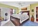 Main bedroom with king-size bed and access to a private balcony at 731 Marina Point Dr # 7310, Daytona Beach, FL 32114