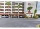 Covered parking area with several cars parked underneath a building at 731 Marina Point Dr # 7310, Daytona Beach, FL 32114