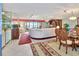 Spacious living area with a large sectional sofa and adjacent dining area at 731 Marina Point Dr # 7310, Daytona Beach, FL 32114