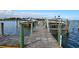 Wooden boat docks extending into the water for convenient boating at 731 Marina Point Dr # 7310, Daytona Beach, FL 32114