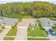 Property view showcasing house, yard, and street at 1768 Creekwater Blvd, Port Orange, FL 32128