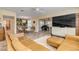 Open concept living area with sectional sofa and dining area view at 501 S Peninsula Ave, New Smyrna Beach, FL 32169