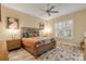 Bright bedroom with wood flooring, a ceiling fan, and plenty of natural light at 501 S Peninsula Ave, New Smyrna Beach, FL 32169
