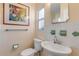 Clean bathroom with updated sink, toilet, and shower/tub combo at 501 S Peninsula Ave, New Smyrna Beach, FL 32169