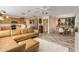 Open floor plan with a large sectional sofa and kitchen views at 501 S Peninsula Ave, New Smyrna Beach, FL 32169
