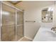 Bathroom featuring a shower and a vanity with a single sink at 501 S Peninsula Ave, New Smyrna Beach, FL 32169