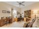 Home office with built-in shelving, desk, and seating at 501 S Peninsula Ave, New Smyrna Beach, FL 32169