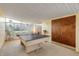 Relaxing game room with ping pong table and plenty of natural light at 501 S Peninsula Ave, New Smyrna Beach, FL 32169