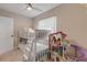 bedroom with bunk beds, playful decor and toys at 501 S Peninsula Ave, New Smyrna Beach, FL 32169