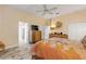 Large bedroom with ensuite bathroom access and ample closet space at 501 S Peninsula Ave, New Smyrna Beach, FL 32169