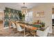 Formal dining room featuring a unique wallpaper and modern furniture at 501 S Peninsula Ave, New Smyrna Beach, FL 32169