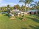 Aerial view of mid-century modern home with large yard at 501 S Peninsula Ave, New Smyrna Beach, FL 32169