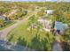 Aerial view of mid-century modern home, showcasing its location and yard at 501 S Peninsula Ave, New Smyrna Beach, FL 32169