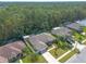 Home boasts curb appeal and wooded surroundings at 5452 Saint Regis Way, Port Orange, FL 32128