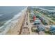 Oceanfront home and beach, aerial view at 6604 S Atlantic Ave, New Smyrna Beach, FL 32169
