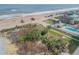 Aerial view of beachfront property with ocean views at 6604 S Atlantic Ave, New Smyrna Beach, FL 32169