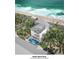 Aerial view of beach house near the Atlantic at 6604 S Atlantic Ave, New Smyrna Beach, FL 32169