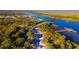 Aerial view of River Breeze Park, boat ramp, and waterfront at 689 Eagle Watch Rd, Oak Hill, FL 32759