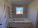 Bathroom with garden tub and built-in shelving at 689 Eagle Watch Rd, Oak Hill, FL 32759