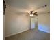Spacious bedroom with ceiling fan and walk-in closet at 689 Eagle Watch Rd, Oak Hill, FL 32759