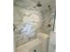 Modern shower with marble tile and built-in seat at 689 Eagle Watch Rd, Oak Hill, FL 32759