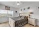 Bright bedroom with a queen bed and ocean views at 5300 S Atlantic Ave # 15-601, New Smyrna Beach, FL 32169