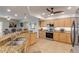 Modern kitchen with stainless steel appliances and granite countertops at 5300 S Atlantic Ave # 15-601, New Smyrna Beach, FL 32169