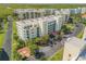 Aerial view of the community, showcasing building and parking areas at 5300 S Atlantic Ave # 15-601, New Smyrna Beach, FL 32169