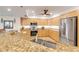 Modern kitchen with stainless steel appliances and granite countertops at 5300 S Atlantic Ave # 15-601, New Smyrna Beach, FL 32169